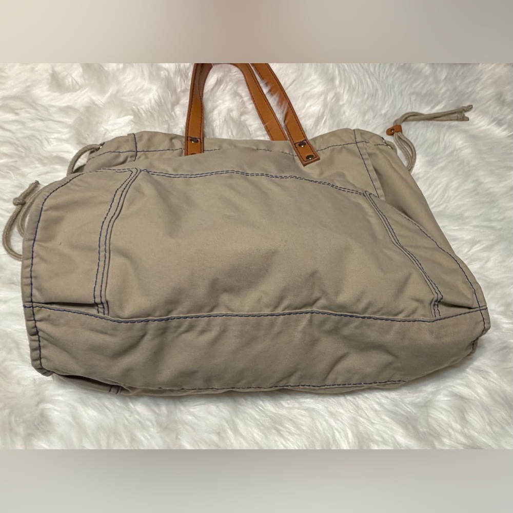 Lacoste Beige Canvas Sportsman Drawstring Tote with Tan Leather Handles - Picture 9 of 14